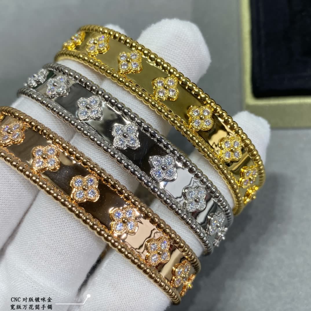 Van Cleef & Arpels Gold and Silver Flower Pattern Bracelets